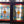 Load image into Gallery viewer, Pair of Multicolored Rondel Stained Glass Windows in Cambria Ash Frames GA9370