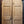 Load image into Gallery viewer, Pair of Newly Stripped Arched Exterior Paneled Doors & Hardware GA4224