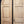 Load image into Gallery viewer, Pair of Newly Stripped Arched Exterior Paneled Doors & Hardware GA4224
