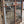 Load image into Gallery viewer, Pair of Tall Wrought Iron Gates with Center Torch Finials & Greek Key Top GA9501