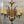 Load image into Gallery viewer, Ornate 5 Light Filigree Chandelier with Heraldic Accents GA9549