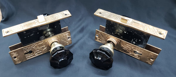 Restored Pair of Eastlake Mortice Lock Sets in Red Brass w/ 12 Point Black Glass Knobs GS00226