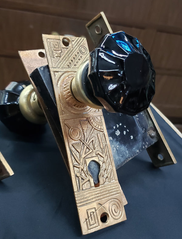 Restored Pair of Eastlake Mortice Lock Sets in Red Brass w/ 12 Point Black Glass Knobs GS00226