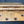 Load image into Gallery viewer, 3 Large 4 1/2" x 4 1/2" Stanley Ball Bearing Beveled Brass Offset Hinges GS00319