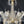 Load image into Gallery viewer, 8 Light Chandelier with Canopy Top Brass Trim & Crystal Flower Prisms GS00426