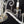 Load image into Gallery viewer, 5 Light Chandelier w/ Canopy Top & Curled Glass Accents  24" x 19" GS00435