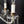 Load image into Gallery viewer, 5 Light Chandelier w/ Canopy Top & Curled Glass Accents  24" x 19" GS00435