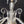 Load image into Gallery viewer, 5 Light Chandelier w/ Canopy Top & Curled Glass Accents  24" x 19" GS00435