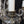 Load image into Gallery viewer, 5 Light Chandelier w/ Canopy Top & Curled Glass Accents  24" x 19" GS00435