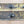Load image into Gallery viewer, Pair of Large Brass Door Backplates with Thumb Latch & Curved Handles GS00449