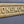 Load image into Gallery viewer, Vintage Solid Brass "NONSMOKING SECTION" Sign 13 3/8" x 2 1/8" GS00572