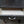 Load image into Gallery viewer, 1800's Steel Medical Desk with Top Draw & Side Tray Shelves on Wheels GA9360
