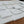 Load image into Gallery viewer, Lot of 78 Reclaimed 3 7/8" x 3 7/8" Square Carrara Honed Marble Tiles GA9540