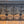 Load image into Gallery viewer, Vintage Ornate Wrought Iron Fireplace Fender 64" L x 16 1/2" T x 14" D GS00820