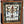 Load image into Gallery viewer, Large Multi Colored Stained Glass Window with Flaming Torch and Ribbon Design in Wood Frame #GA1159