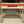 Load image into Gallery viewer, Mid Century Modern White & Red Porcelain Top Draw Table #GA9116