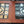 Load image into Gallery viewer, Pair of Beveled Leaded Glass Windows with Center Circle Design in Wood Frames #GA9133