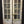 Load image into Gallery viewer, Pair of 8 Pane & Wood Narrow Exterior French Doors 24" x 79 1/2"
