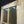 Load image into Gallery viewer, Pair of 8 Pane & Wood Narrow Exterior French Doors 24" x 79 1/2"