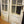 Load image into Gallery viewer, Pair of 8 Pane & Wood Narrow Exterior French Doors 24" x 79 1/2"