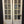 Load image into Gallery viewer, Pair of 8 Pane & Wood Narrow Exterior French Doors 24" x 79 1/2"