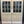 Load image into Gallery viewer, Pair of 9-Pane Raised Paneled Double Doors GA20727

