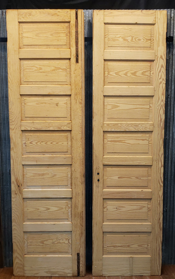 Pair of Newly Stripped 7 Panel Interior Doors 25 5/8" x 95 1/4" GA9367