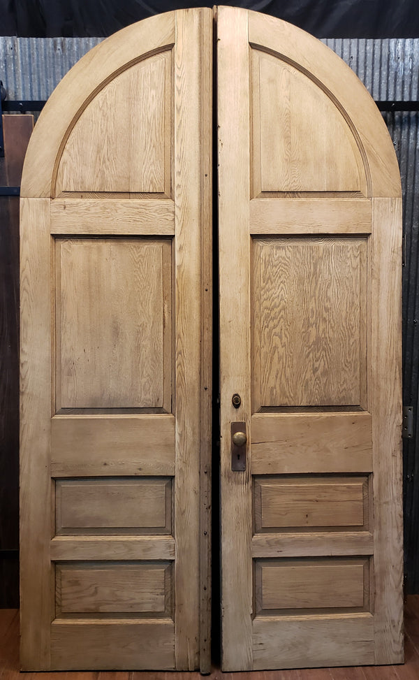 Pair of Newly Stripped Arched Exterior Paneled Doors & Hardware GA9384
