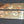 Load image into Gallery viewer, Pair of Restored Red Brass Door Push Plates 15" x 3 1/2" GS01053
