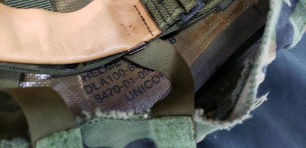 Military Helmet with Woodland Camo Cover and Leather Liner