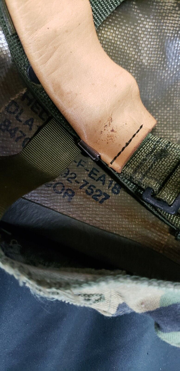 Military Helmet with Woodland Camo Cover and Leather Liner