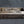 Load image into Gallery viewer, Restored Carpenter Style Dead Bolt Rim Lock Set with Key 5" x 3 1/2" GA9694
