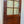 Load image into Gallery viewer, Arched 4-Pane Faux Wood Steel Doors w/ Chicken Wire Glass GA20574
