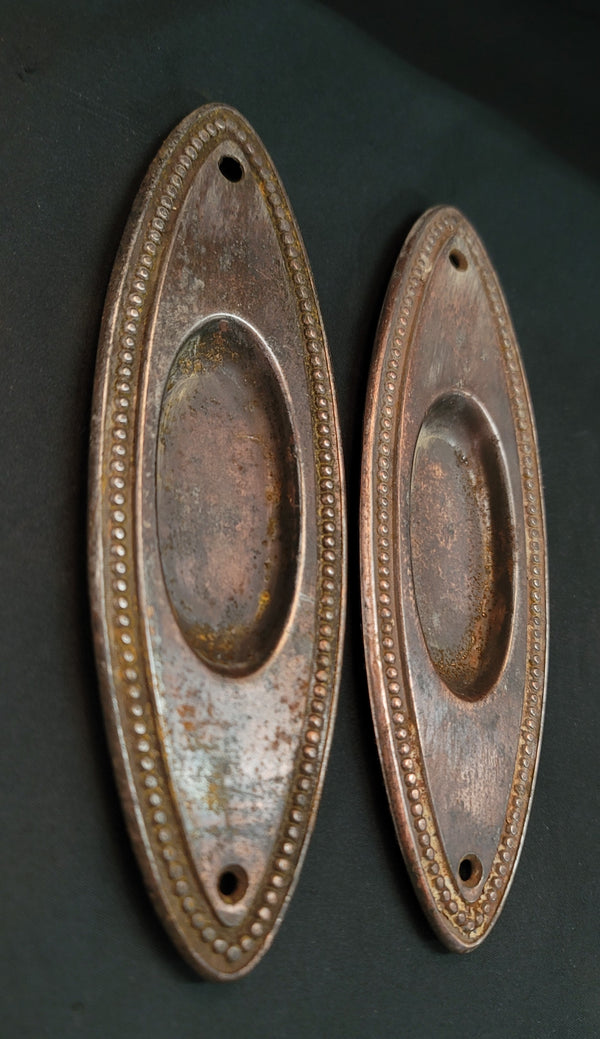 Pair of Oval Pocket Door Escutcheon Plates with Beaded Trim 7" x 2 1/4" GS01059