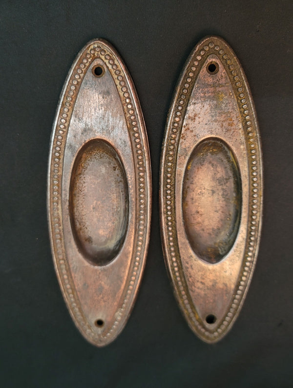 Pair of Oval Pocket Door Escutcheon Plates with Beaded Trim 7" x 2 1/4" GS01059