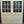 Load image into Gallery viewer, Pair of 9-Pane Raised Paneled Double Doors GA20727
