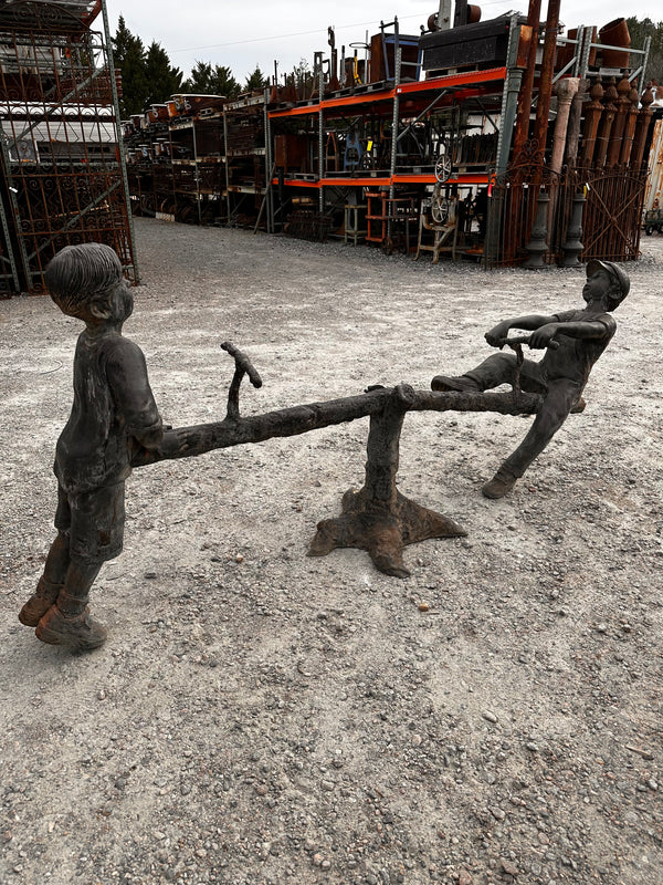 SHORT BRONZE STATUES BOYS PLAYING ON SEESAW GA11017