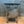 Load image into Gallery viewer, 1930s Refurbished Side Table w/ Stained Ebony Wood Top GS6032
