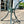 Load image into Gallery viewer, Outdoor Patio Cast Aluminum Table Bases w/ Coriander Table Tops GA20167
