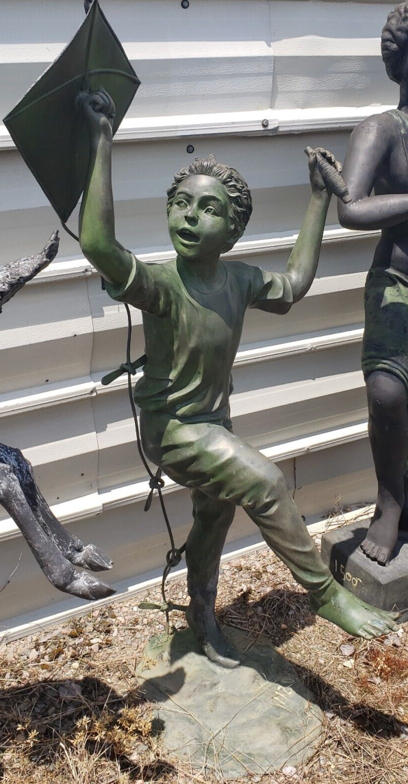 BRONZE STATUE LONE BOY PLAYING WITH KITE GA11018