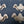 Load image into Gallery viewer, Architectural Salvage Brass Etched Floral Design Drawer Pull Handles Set of 9
