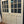 Load image into Gallery viewer, Pair of 9-Pane Raised Paneled Double Doors GA20727
