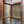 Load image into Gallery viewer, Wooden Storm Door with Glass Panels and Screen Speakeasy Window GA21526
