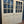 Load image into Gallery viewer, Pair of 9-Pane Raised Paneled Double Doors GA20727
