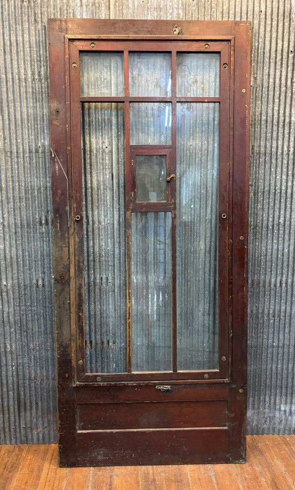 Wooden Storm Door with Glass Panels and Screen Speakeasy Window GA21526