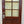 Load image into Gallery viewer, Arched 4-Pane Faux Wood Steel Doors w/ Chicken Wire Glass GA20574
