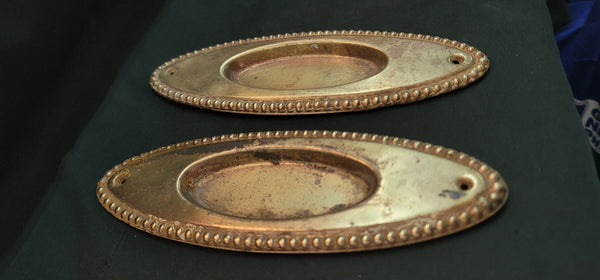 Pair of Oval Brass Plated Pocket Door Escutcheon Plates 7 1/2" x 2 1/2" GS01060