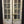Load image into Gallery viewer, Pair of 8 Pane &amp; Wood Narrow Exterior French Doors 24&quot; x 79 1/2&quot;
